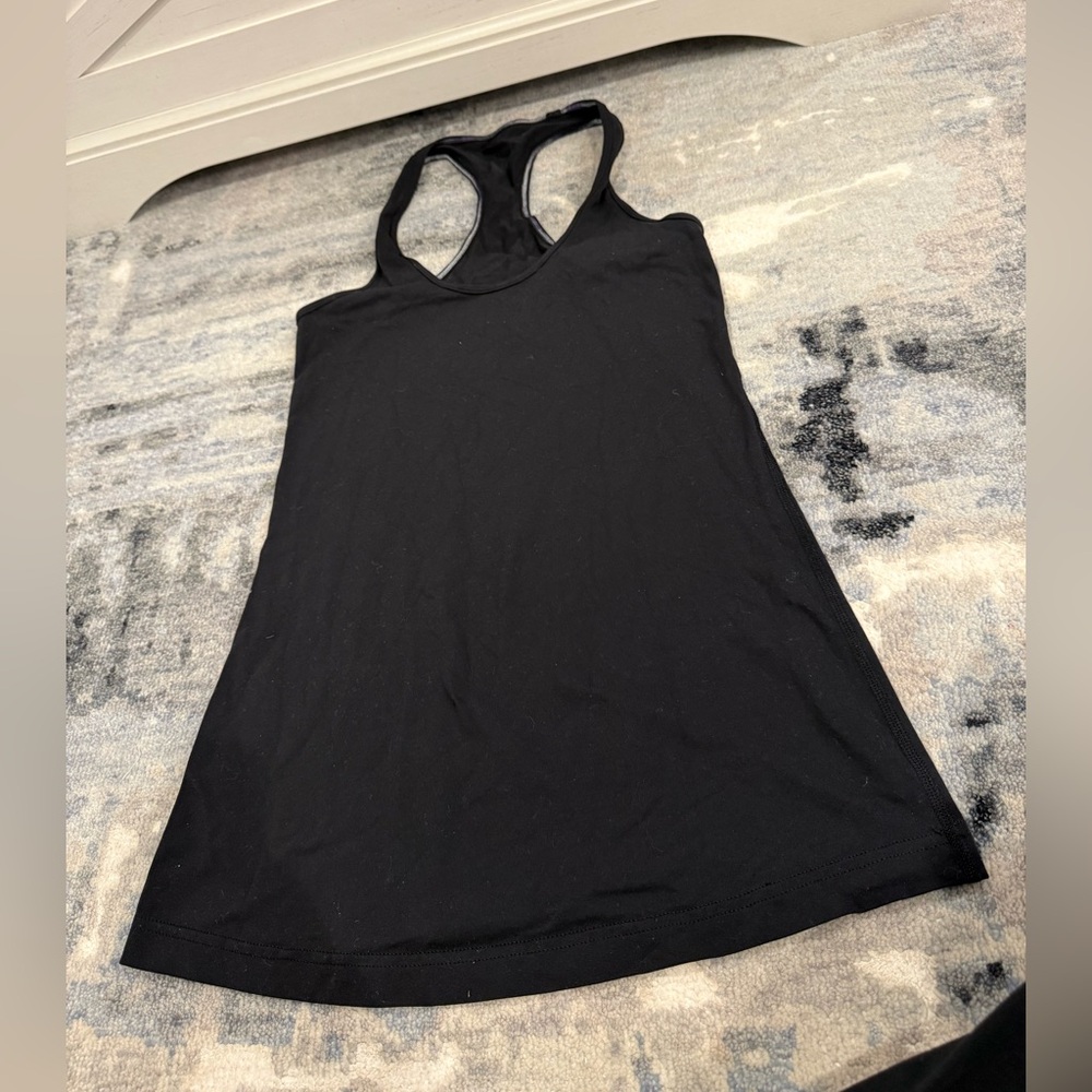 Lululemon black racer back tank estimated size 4